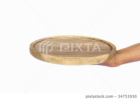 Hand holding wooden plate 34753930