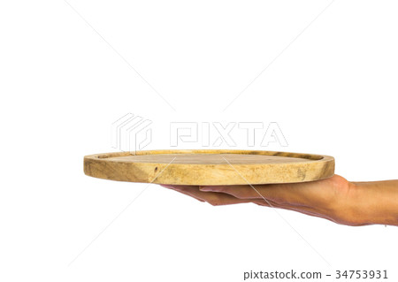 Hand holding wooden plate Hand holding wooden plate 34753931