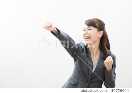 Businesswoman punch 34756644