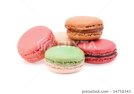 Sweet and colourful french macaroons on white Sweet and colourful french macaroons on white 34758343