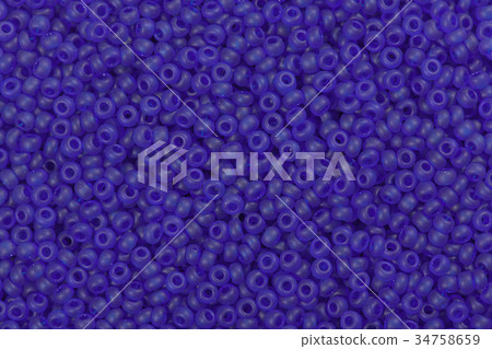 Background of beautiful purple seed beads. Background of beautiful purple seed beads. 34758659