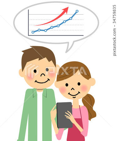A couple operating a tablet A couple operating a tablet 34759835