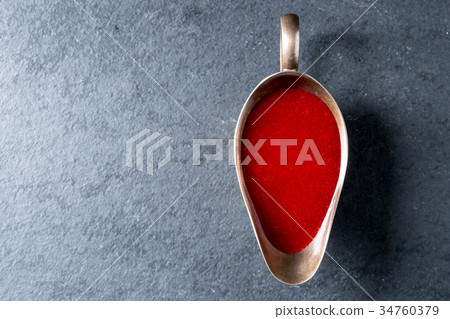 Cranberry sauce in a gravy boat on gray slate free 34760379