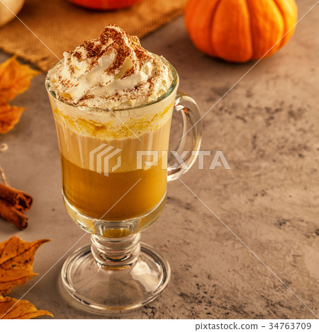 Pumpkin spice latte with whipped cream 34763709