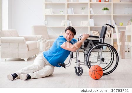 Young basketball player on wheelchair recovering Young basketball player on wheelchair recovering 34763761