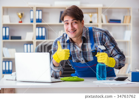 Male cleaner working in the office 34763762