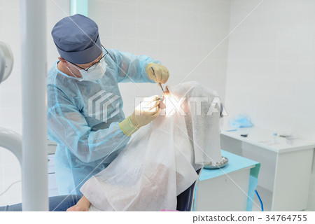 Dental surgery operation in modern dentist clinic 34764755