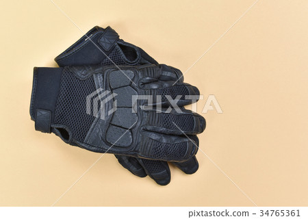 leather and textile gloves for riding a motorcycle 34765361