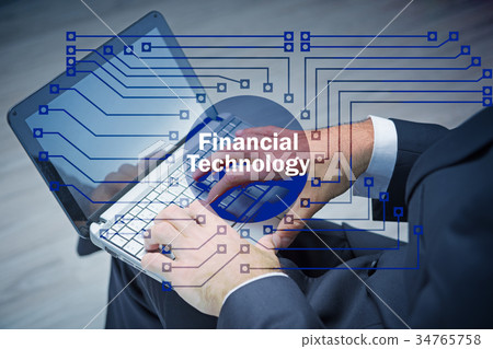 Hands working on laptop in financial technology Hands working on laptop in financial technology 34765758