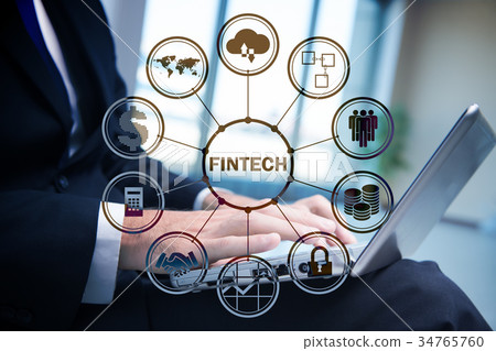 Hands working on laptop in financial technology Hands working on laptop in financial technology 34765760