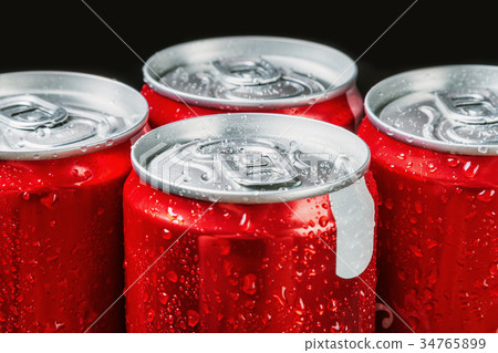 aluminum cans of soda. Soft focus aluminum cans of soda. Soft focus 34765899