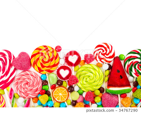 Colorful candies and lollipops. Top view. 34767290