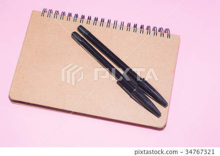 Wooden notepad and black pens Wooden notepad and black pens 34767321