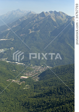 village in a mountain valley; view from the peak village in a mountain valley; view from the peak 34767769