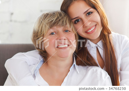 Mature grandmother and teen granddaughter and teen Mature grandmother and teen granddaughter and teen 34768230