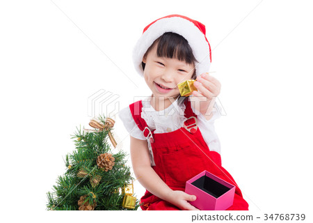 Little girl wearing santa claus red dress Little girl wearing santa claus red dress 34768739