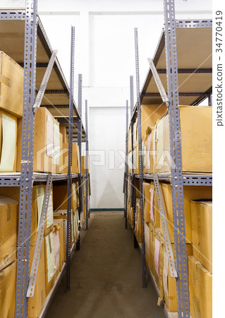 Cardboards box with products in the warehouse Cardboards box with products in the warehouse 34770419
