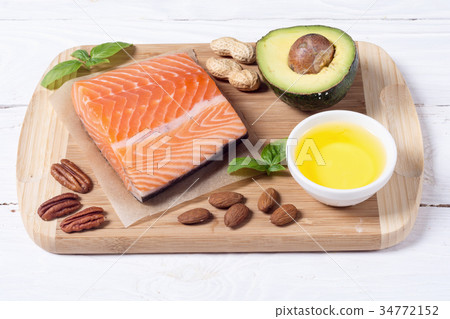 Healthy food vegetables , nuts and salmon Healthy food vegetables , nuts and salmon 34772152