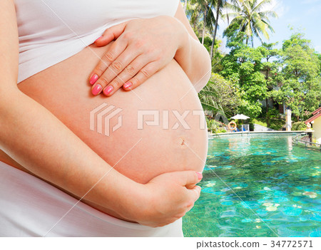A pregnant belly at the spa A pregnant belly at the spa 34772571