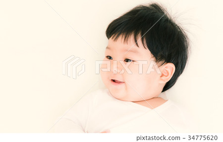 Baby girl smiling with copy space. (Vintage tone) 34775620