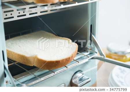 Baking bread with an oven toaster 34775799
