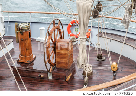 Steering wheel for captain on an old sailboat 34776329