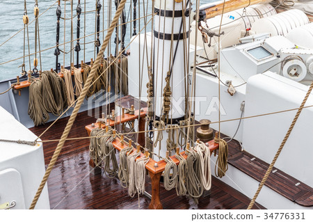 Ropes on the mast for sailing. Ropes on the mast for sailing. 34776331