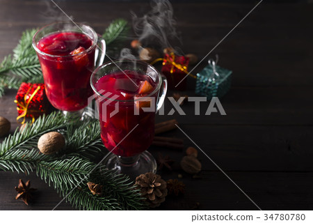 Cup of hot wine with spices 34780780