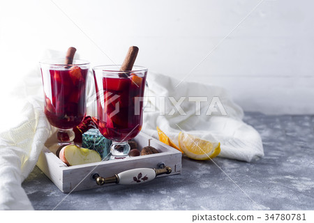 Cup of hot wine with spices 34780781