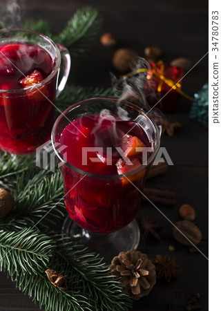 Cup of hot wine with spices Cup of hot wine with spices 34780783
