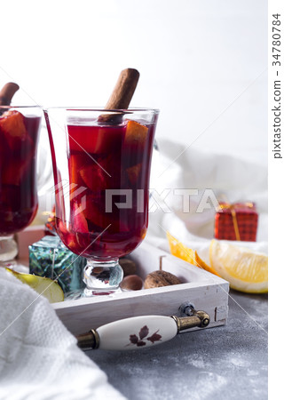 Cup of hot wine with spices 34780784