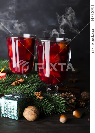Cup of hot wine with spices 34780791