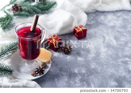 Cup of hot wine with spices Cup of hot wine with spices 34780793