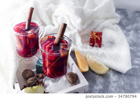 Cup of hot wine with spices 34780794