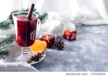 Cup of hot wine with spices Cup of hot wine with spices 34780804