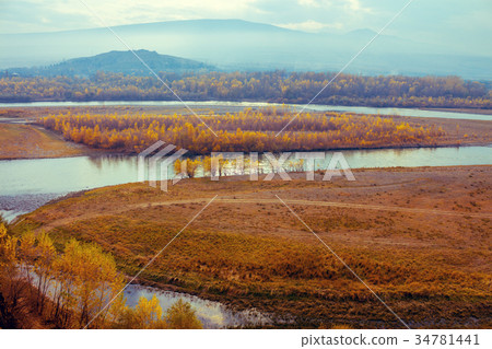 A winding river in the valley 34781441