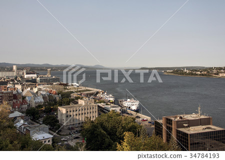 Aerial view of skyline and Saint Lawrence stream Aerial view of skyline and Saint Lawrence stream 34784193