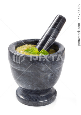 pesto sauce in mortar on white pesto sauce in mortar on white 34785489