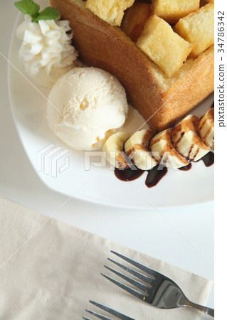 Honey Toast on White Dish is Delicious. Honey Toast on White Dish is Delicious. 34786342