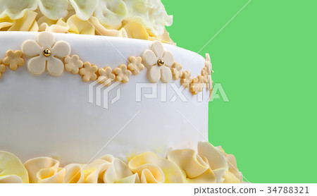 Wedding cake with yellow flowers 34788321