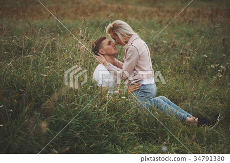 beautiful blonde girl with boyfriend 34791380