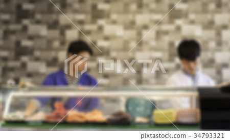 blur image of Chefs are making sushi. 34793321