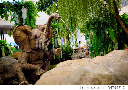 Elephant statue water spout spray in wild model. Elephant statue water spout spray in wild model. 34794742