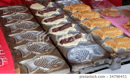 Taiyaki machine, a pastry with red bean in Japan Taiyaki machine, a pastry with red bean in Japan 34796451