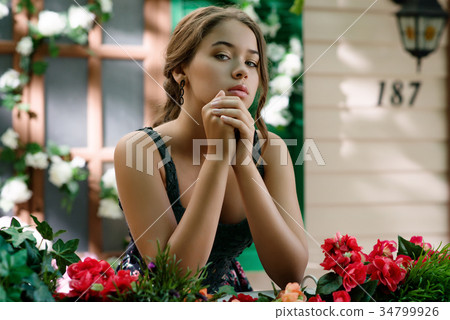 Young girl in the garden 34799926
