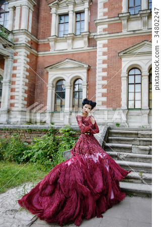 Beautiful witch in purple dress Beautiful witch in purple dress 34802247