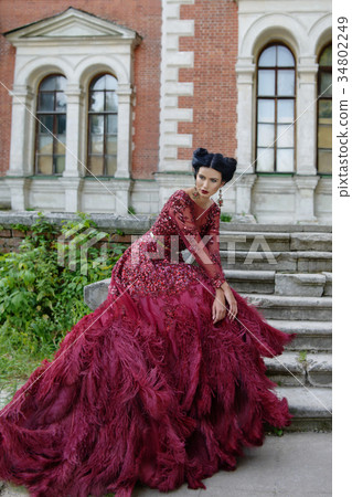Beautiful witch in purple dress Beautiful witch in purple dress 34802249