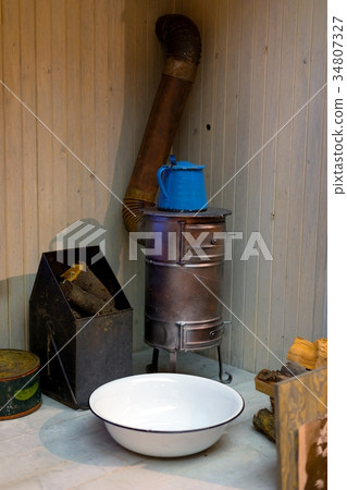 Old vintage heating equipment closeup photo 34807327