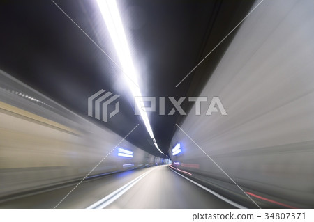 Artificial road tunnel as abstract blurred Artificial road tunnel as abstract blurred 34807371