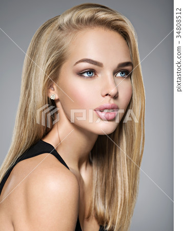Beautiful young woman with long  straight  hairs 34808512